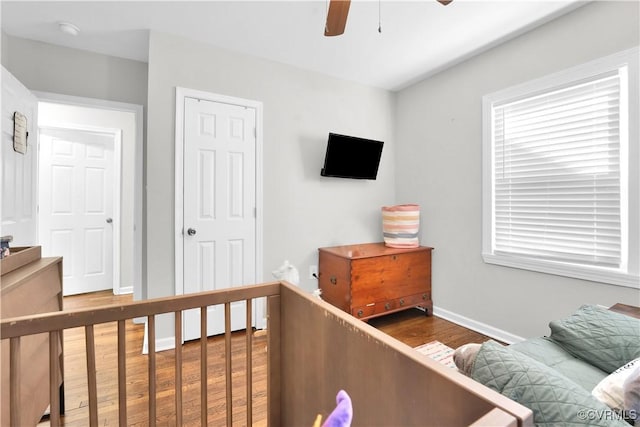 bedroom featuring ceiling fan and hardwood / wood-style floors