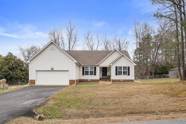 ranch-style home featuring a garage and a front lawn