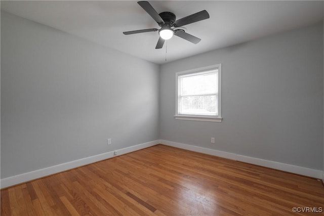 unfurnished room featuring hardwood / wood-style floors and ceiling fan