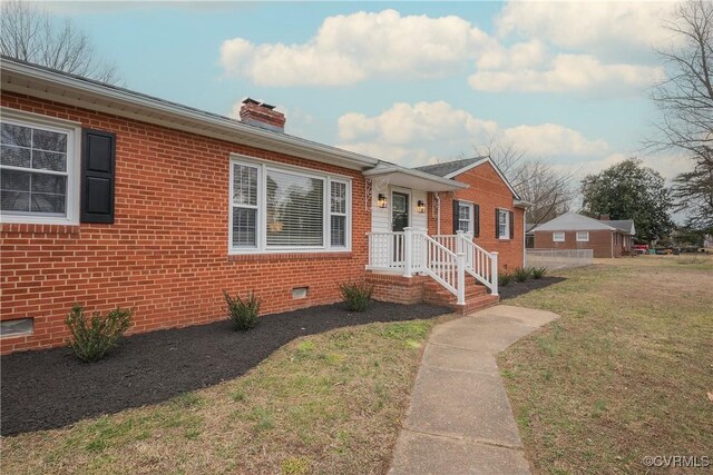 view of front of home with a front yard