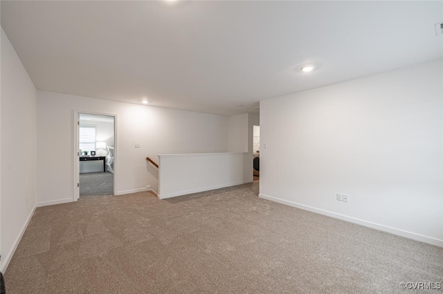 empty room featuring carpet floors