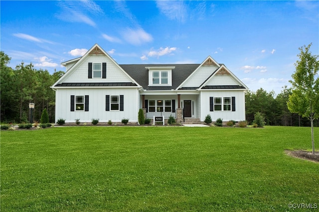 craftsman house with a porch and a front yard