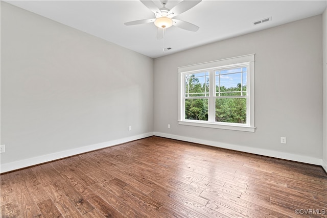 unfurnished room featuring hardwood / wood-style flooring and ceiling fan