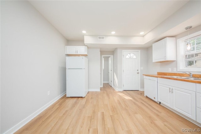 2414 Marion Mashore St, Richmond, VA 23224 - kitchen with sink, white appliances, white cabinetry, butcher block counters, and light wood-type flooring