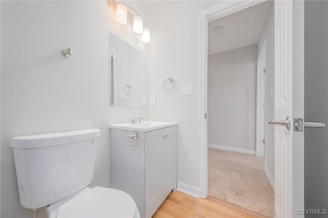 2414 Marion Mashore St, Richmond, VA 23224 - bathroom with hardwood / wood-style flooring, vanity, and toilet