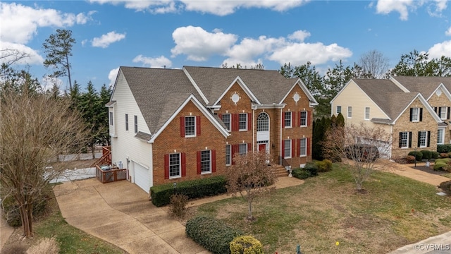 view of front of house featuring a garage and a front yard