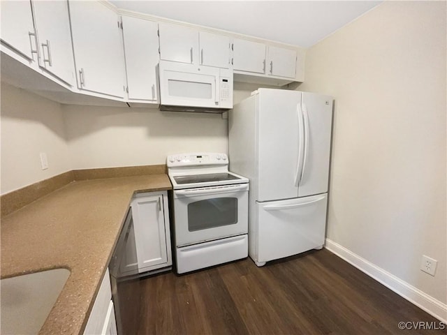 kitchen with sink, dark wood-type flooring, white cabinets, and white appliances