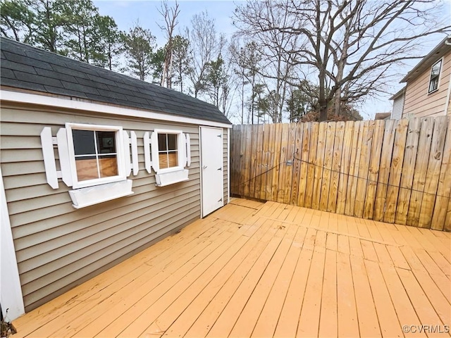 wooden terrace with an outdoor structure