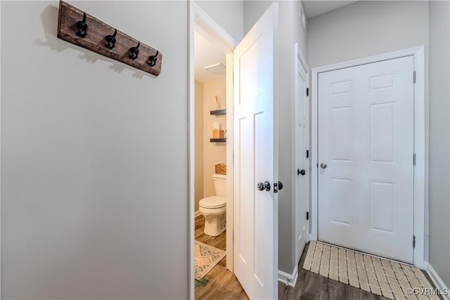 interior space with dark hardwood / wood-style floors