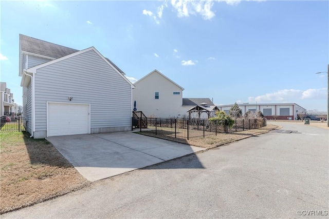 view of side of property featuring a garage