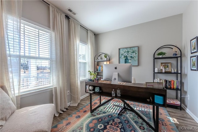 office space featuring hardwood / wood-style floors