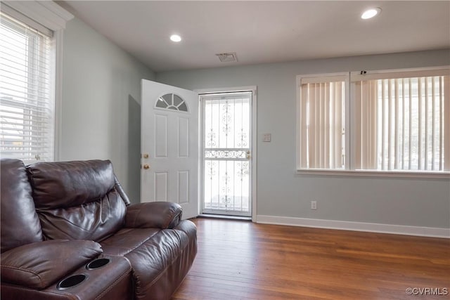 interior space with hardwood / wood-style flooring