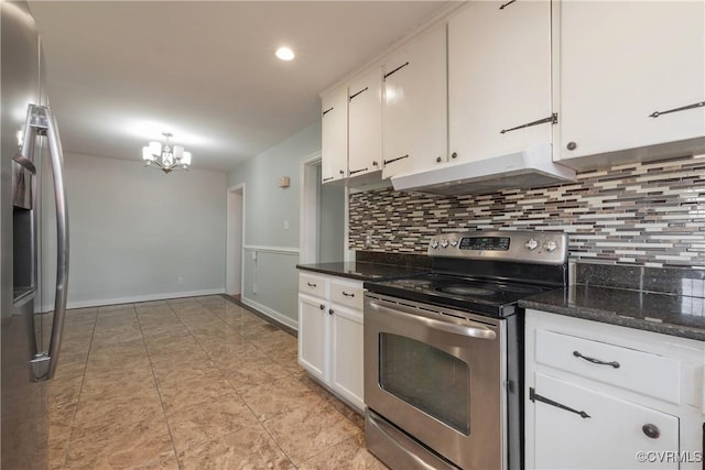 kitchen featuring tasteful backsplash, dark stone counters, white cabinets, and appliances with stainless steel finishes