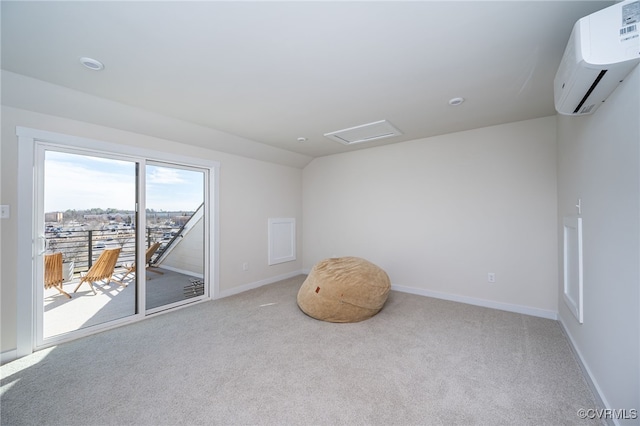 unfurnished room with lofted ceiling, light carpet, and a wall unit AC