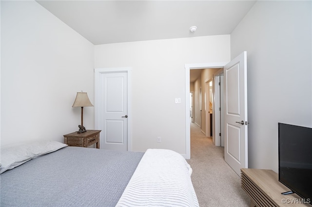 bedroom with light carpet