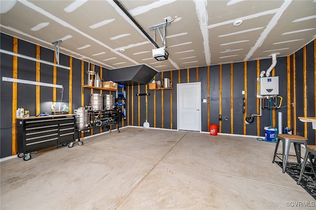 garage featuring a garage door opener and water heater