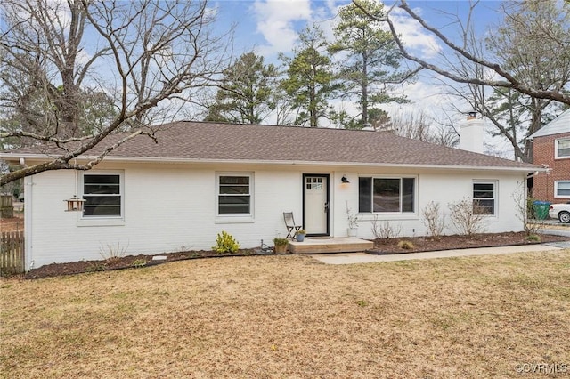 ranch-style house with a front yard