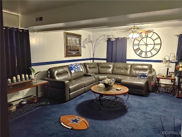 carpeted living room with ceiling fan