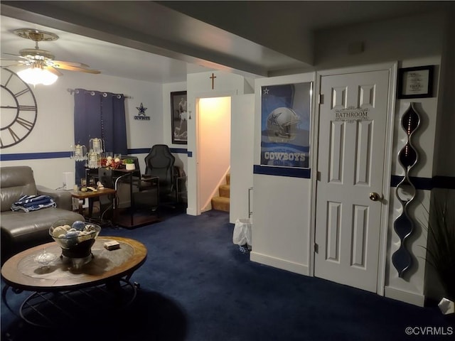 carpeted living room featuring ceiling fan