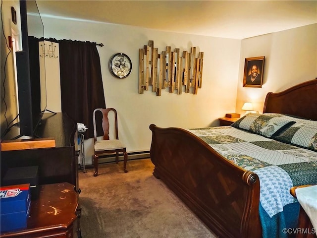 carpeted bedroom with a baseboard heating unit