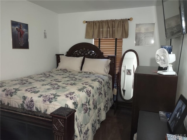 bedroom featuring dark wood-type flooring