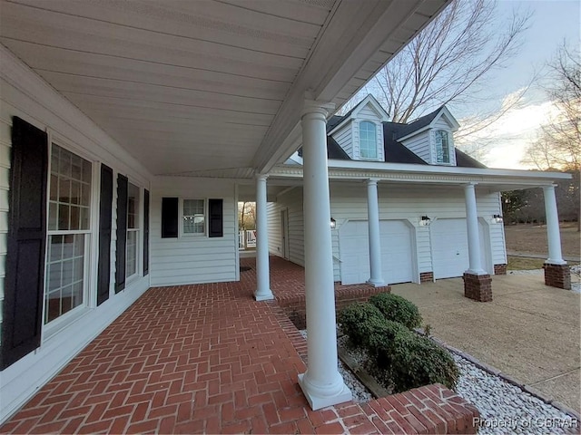 view of patio with a garage