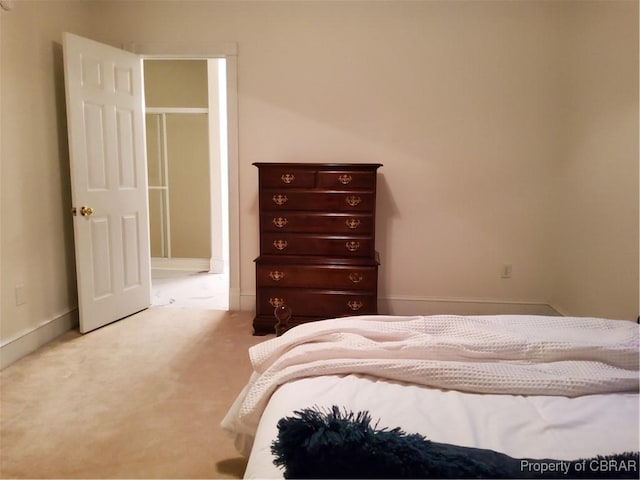 bedroom with light carpet