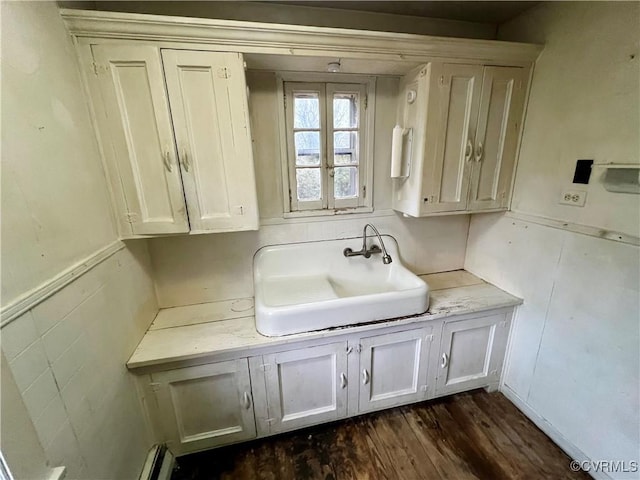 interior space featuring sink and hardwood / wood-style floors