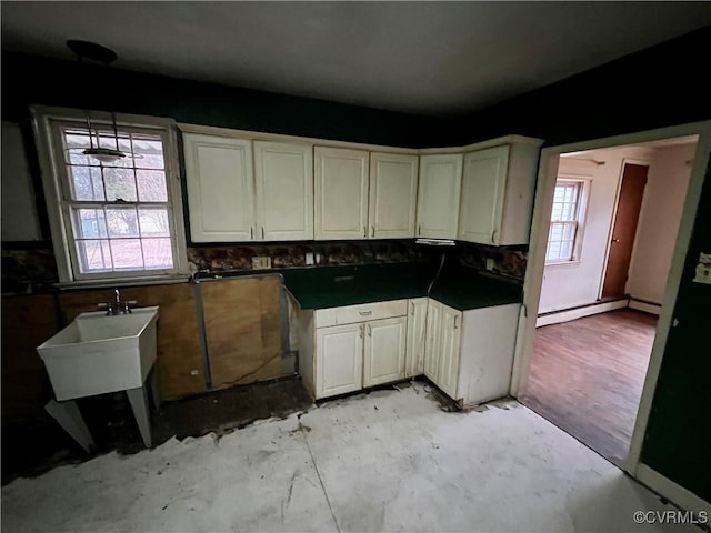 kitchen featuring a healthy amount of sunlight and sink