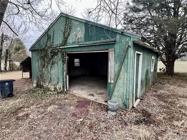 view of outbuilding featuring a garage