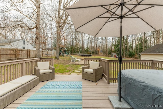 wooden deck with a playground