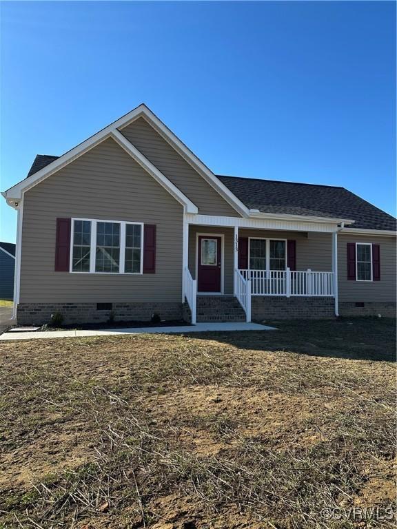 single story home featuring a front yard and a porch