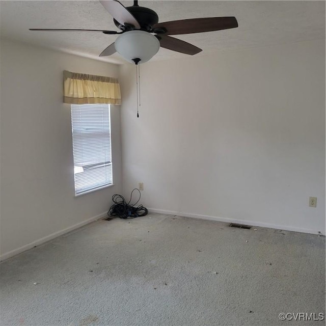 empty room featuring carpet floors