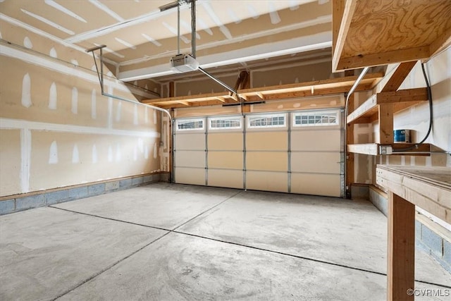 garage featuring a garage door opener