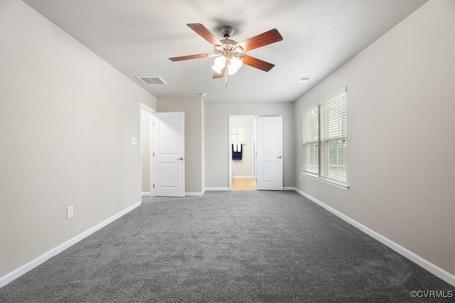 interior space with ceiling fan and carpet