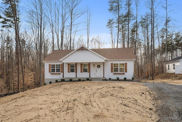 ranch-style house featuring covered porch