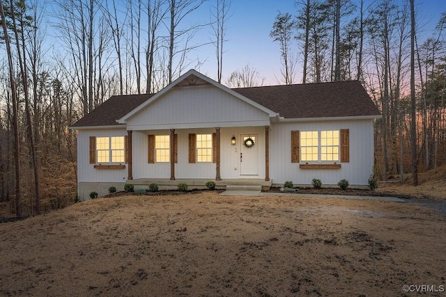 ranch-style home featuring a porch