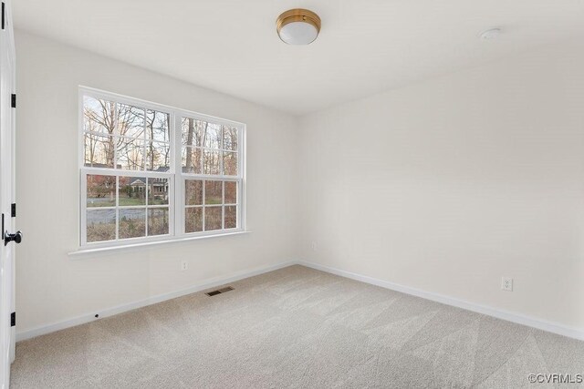 empty room with carpet floors