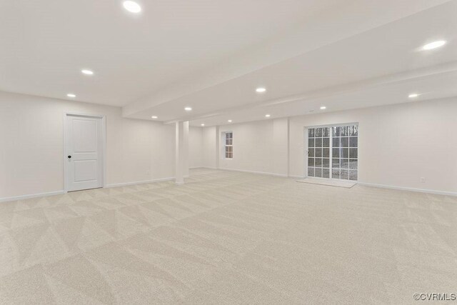 basement with light colored carpet