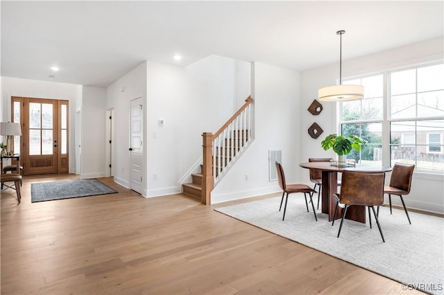 dining room with light wood-type flooring