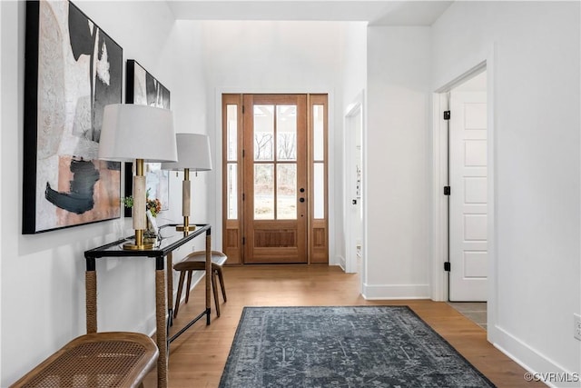 foyer with light hardwood / wood-style flooring