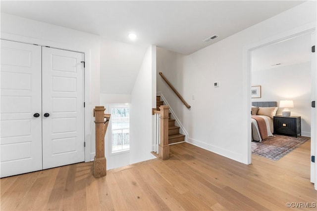 entryway with light hardwood / wood-style flooring