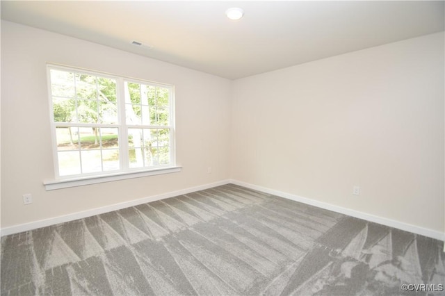 view of carpeted spare room