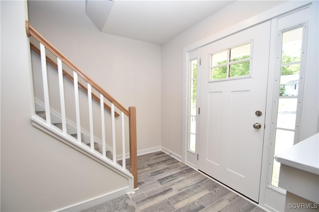 entryway with light hardwood / wood-style floors