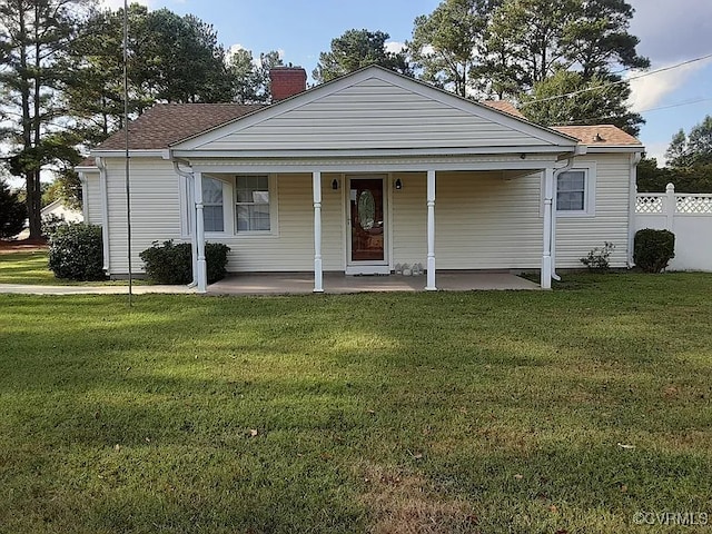 view of front of home with a front yard