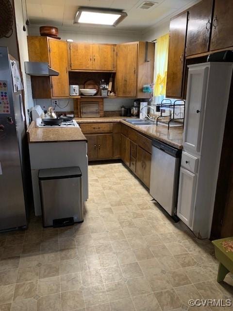 kitchen featuring appliances with stainless steel finishes and sink