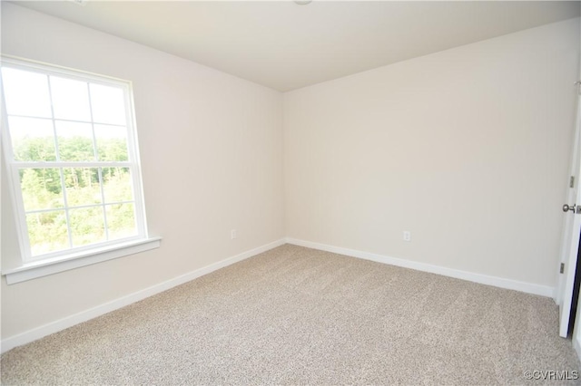 view of carpeted spare room