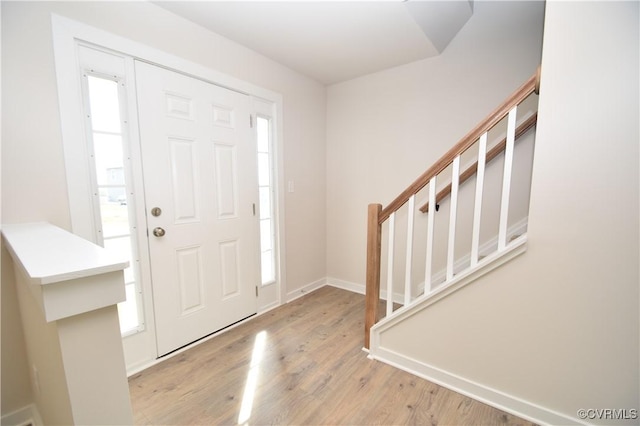 entrance foyer with light hardwood / wood-style flooring