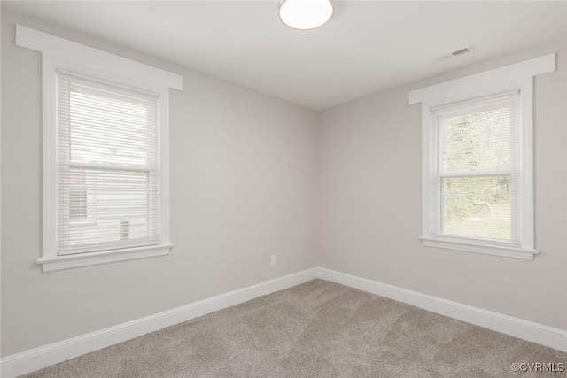 view of carpeted spare room