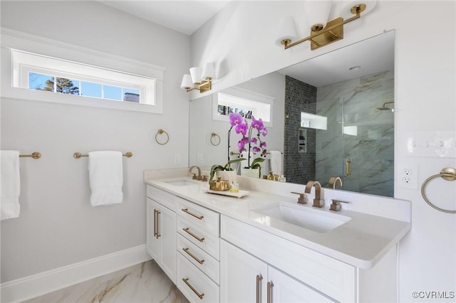 bathroom with vanity and a shower with shower door